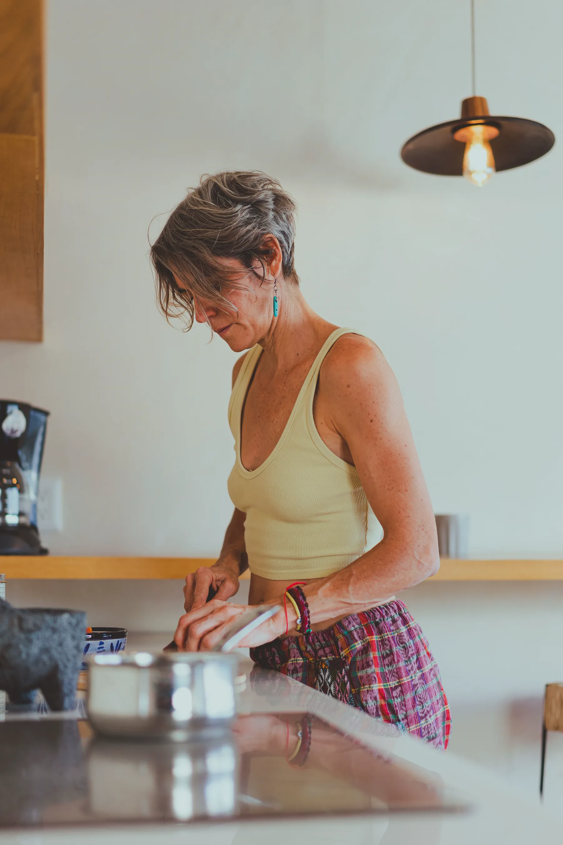 Preparing breakfast in a sunlit kitchen